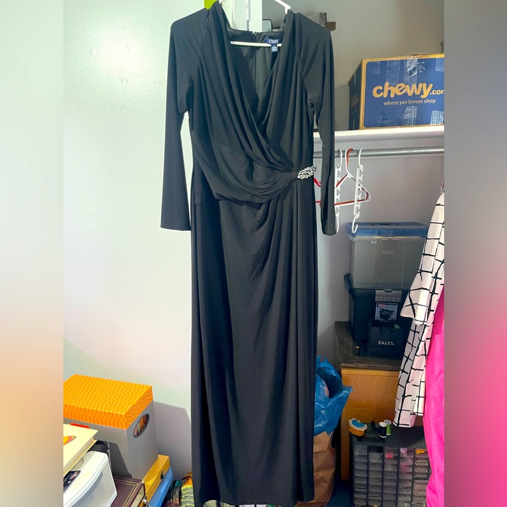 Long sleeve, floor length evening dress.